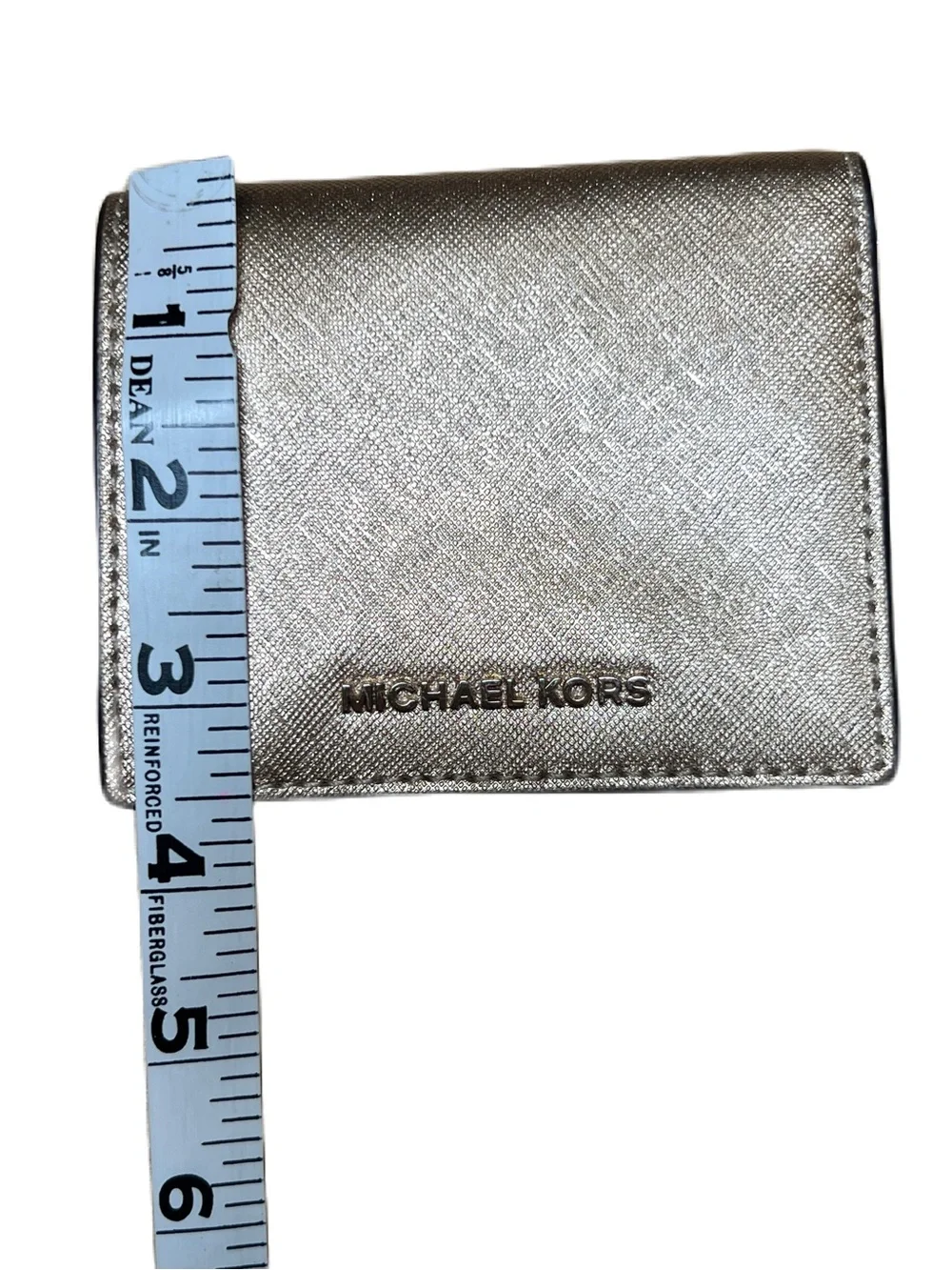 MICHAEL KORS Gold wallet in Saffiano Coated Leather.